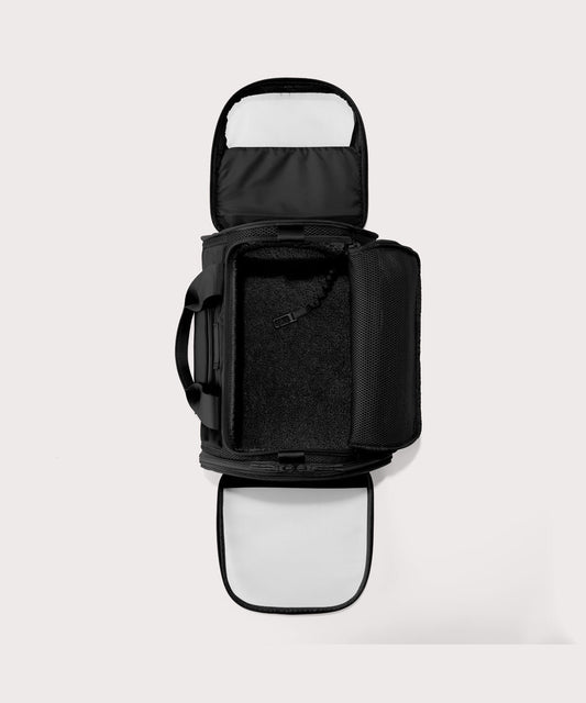 Dagne Dover Large Kyoto Pet Carrier in black seen unzipped, top down view.