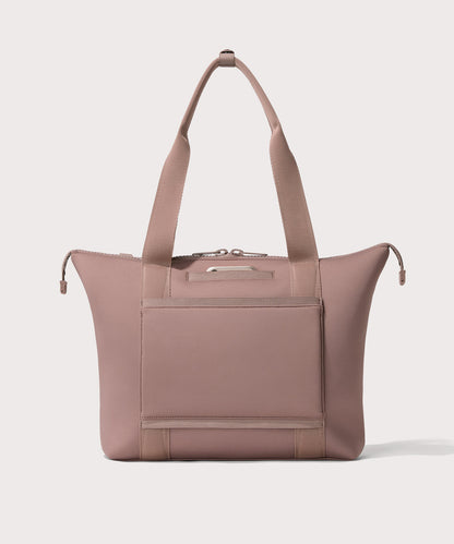 Tote in a pink seen from the back view showing phone pocket.