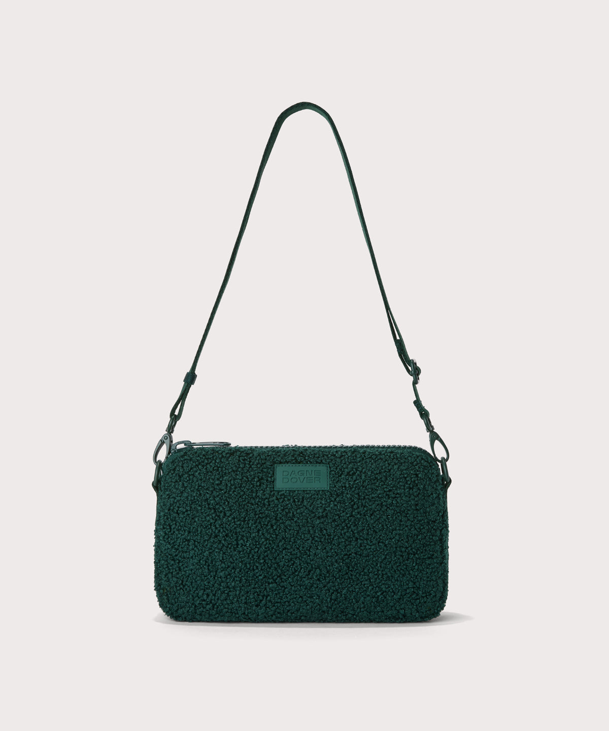 nora shoulder bag in a saturated, jewel-toned deep green with bold blue undertones. In a Faux Shearling a soft, wool-like plush made with recycled materials
