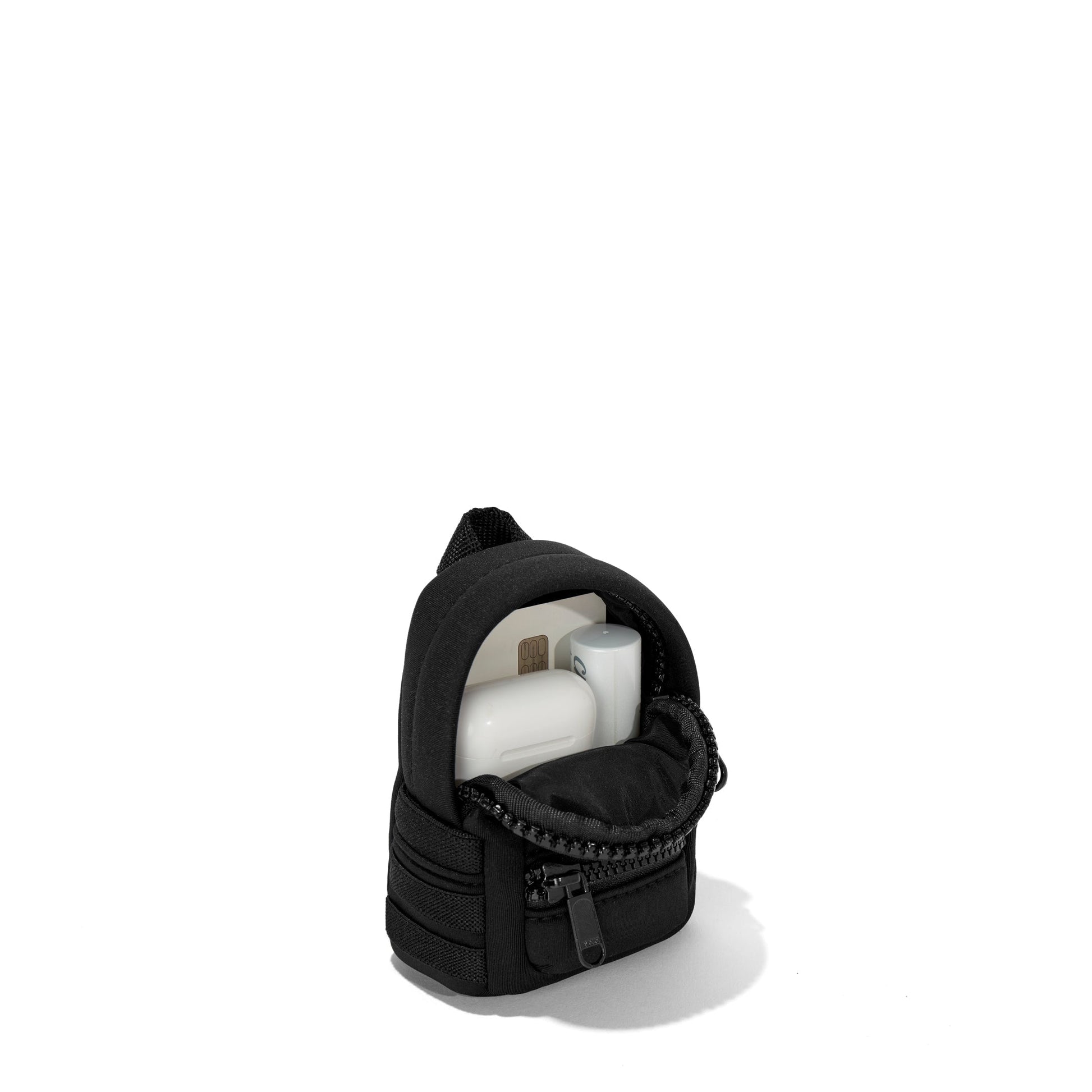 Dagne Dover Dakota Keychain in black unzipped, showing interior.