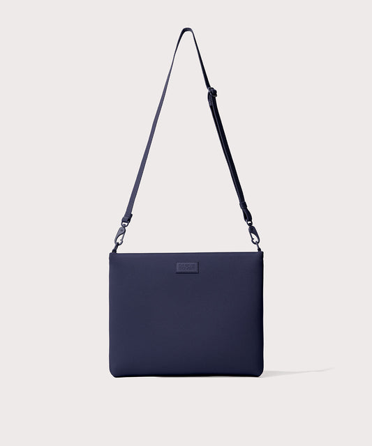 14 inch laptop shoulder bag in navy blue seen from the front view.