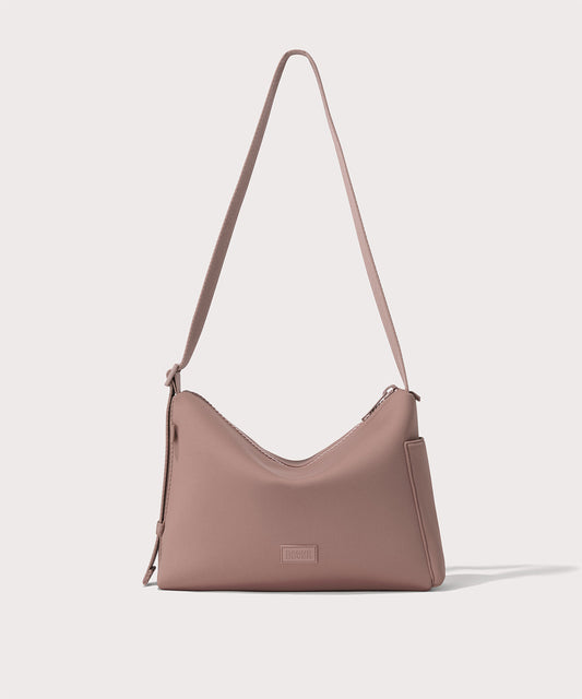 Shoulder bag in a pink seen from the front view.