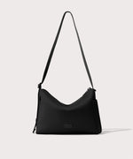 Shoulder bag in a black seen from the front view.
