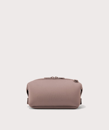 Dagne Dover Small Hunter Toiletry Bag in pink seen from the back.