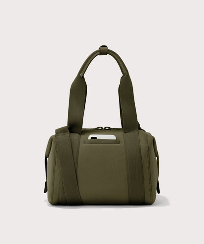 small Landon Carryall in dark green, displaying an exterior phone pocket