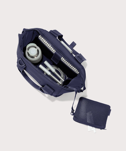small Landon Carryall in dark blue unzipped, top down view