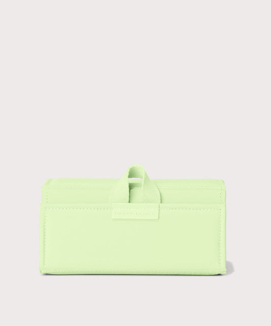 Dagne Dover Remi foldable glasses holder in matcha green.