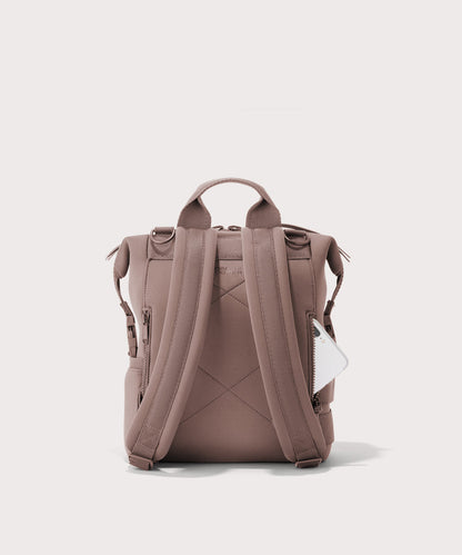 Dagne Dover small Indi Diaper Backpack in pink seen from the back.