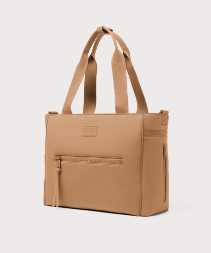 Dagne Dover large Wade Diaper Tote in camel brown seen from an angle.