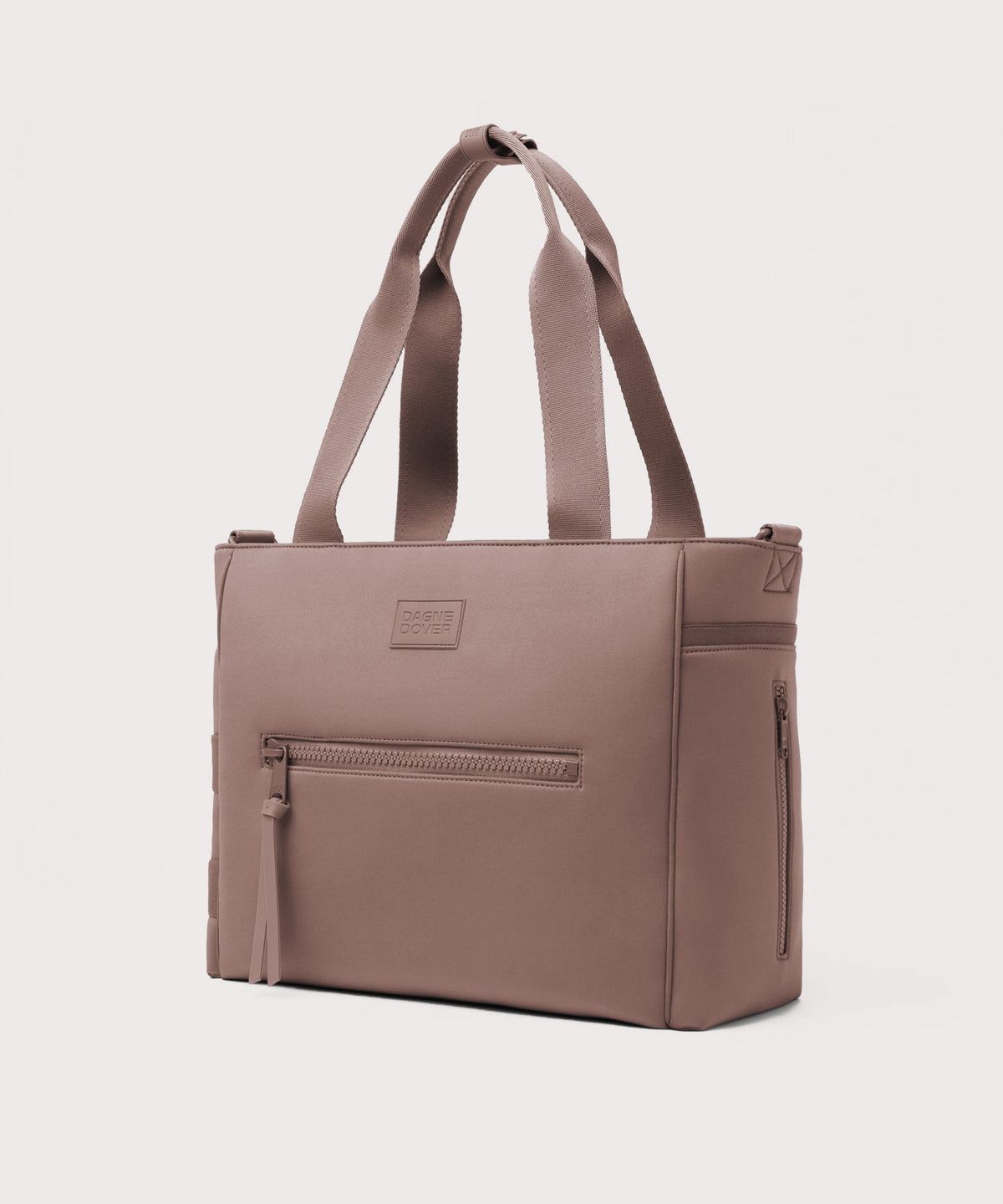 Dagne Dover large Wade Diaper Tote in pink seen from an angle.