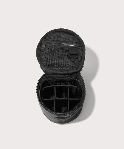 Dagne Dover large Mila Toiletry Pouch in black unzipped with the 6 adjustable compartments.