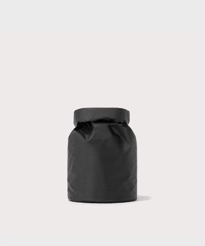 Dagne Dover Rae Roll-Top Dry Bag in black seen from the back.