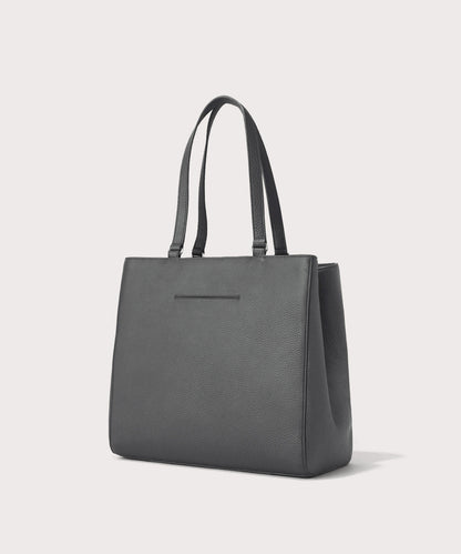 Dagne Dover large Allyn Tote in grey with the exterior slip pocket.